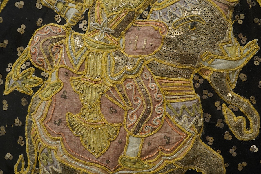 An Indian stumpwork panel of a figure and elephant